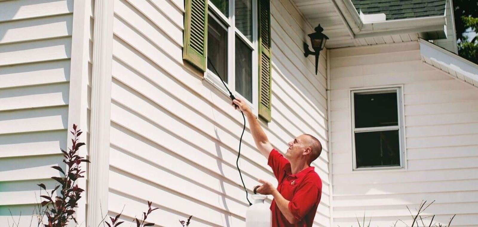 larry spraying window